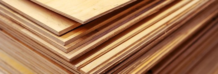 A,Lot,Of,Plywood,Sheets,Are,Stacked.,Trade,In,Wood